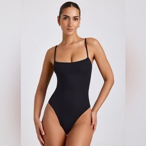 Oh Polly BODY TO BODY
SCOOP NECK THONG BODYSUIT IN BLACK